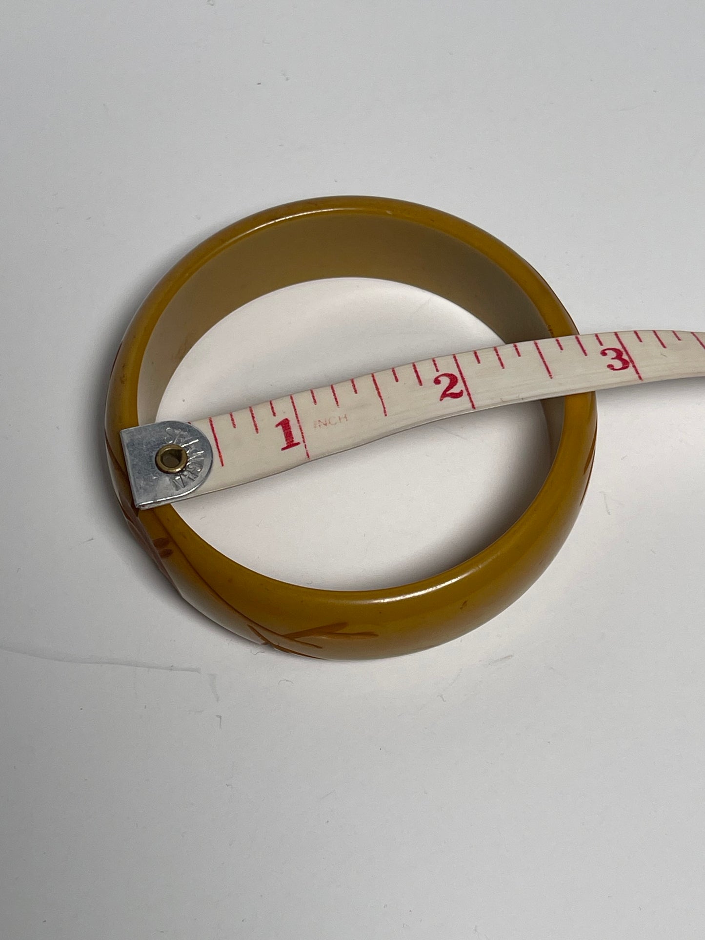 1930’s Vintage Bakelite Butterscotch Carved Bird Bangle